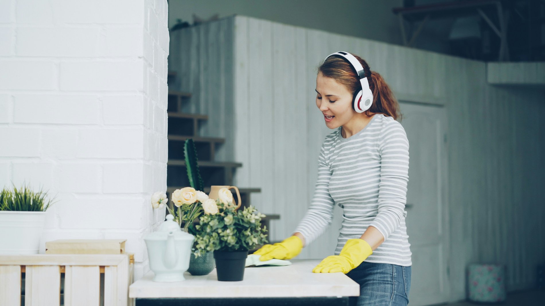 Woman cleaning surfaces after remodel